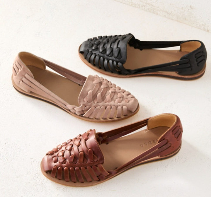 Casual women's flat slip-on sandals with a comfortable closed-toe design, great for summer everyday wear.