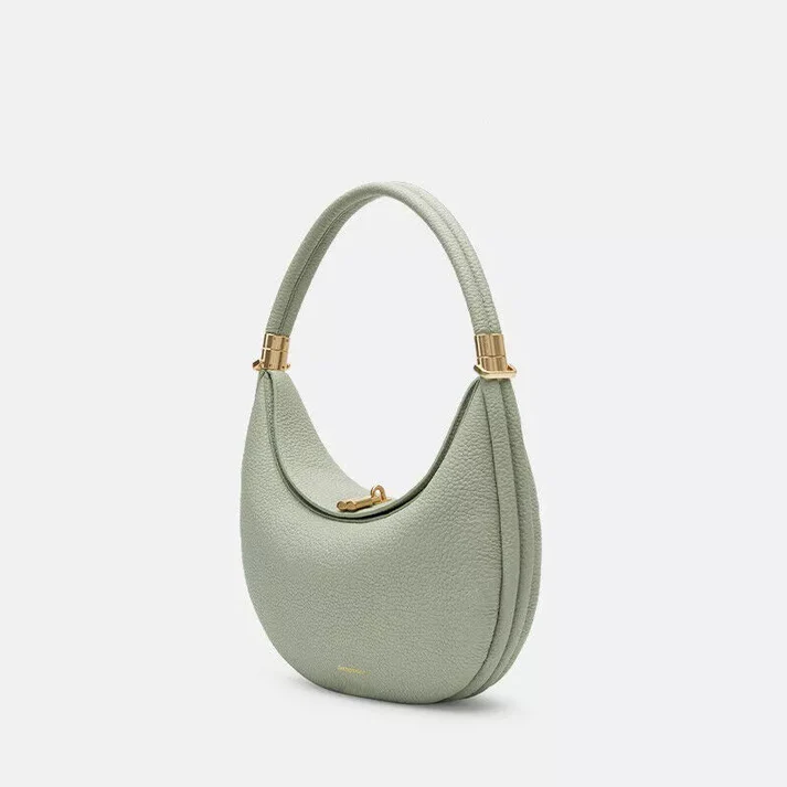 Stylish multi-strap women's handbag, a chic synthetic leather everyday accessory with versatile carrying options.