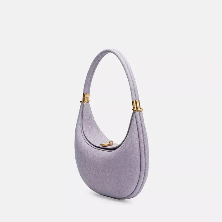 Women's chic multi-strap handbag in synthetic leather, functions as an elegant crossbody, shoulder, or clutch bag.