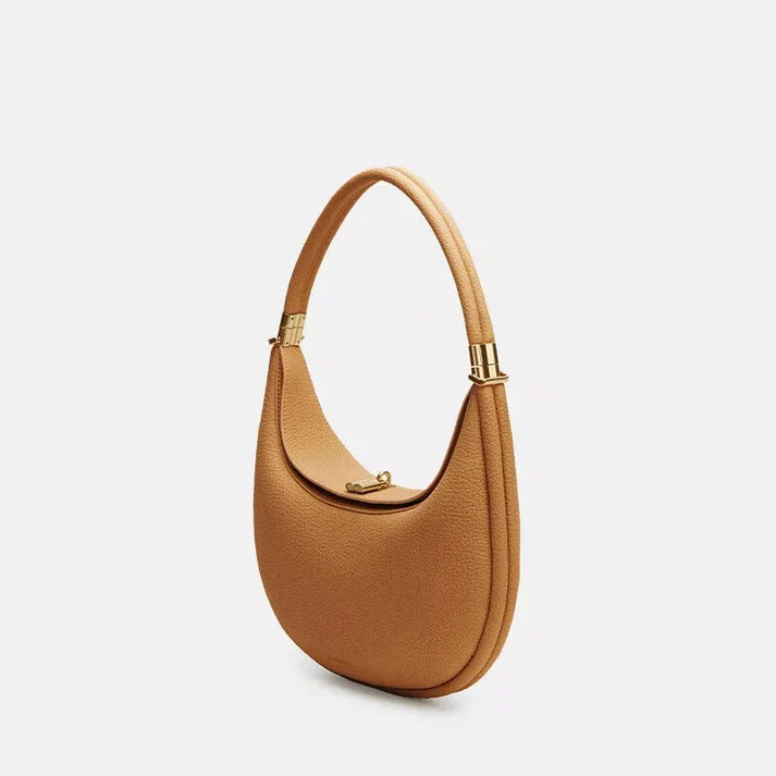 Women's versatile multi-strap handbag. Elegant synthetic leather shoulder bag, crossbody, or chic clutch for daily use.