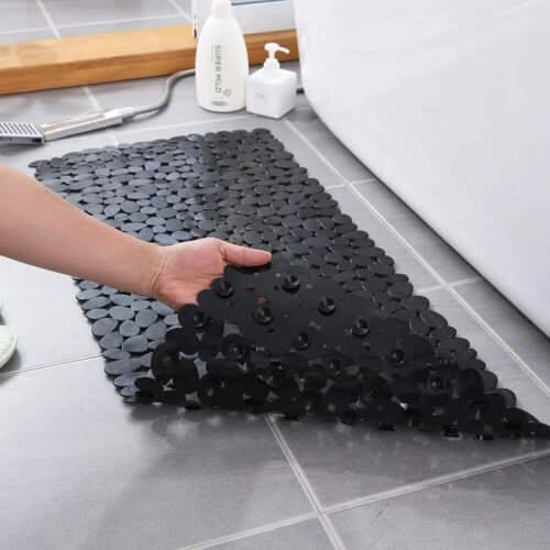 Durable PVC non-slip bath mat, easy to clean, providing comfort and hygiene in your shower.