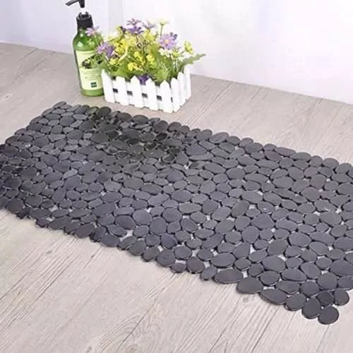 Comfortable anti-slip shower mat, quick-dry design for hygiene & home safety in wet areas.