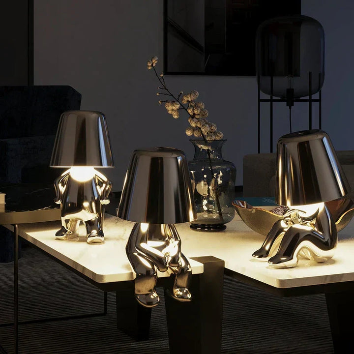 Touch control LED figurine lamp, dimmable. Cordless & USB rechargeable for convenient home decor.