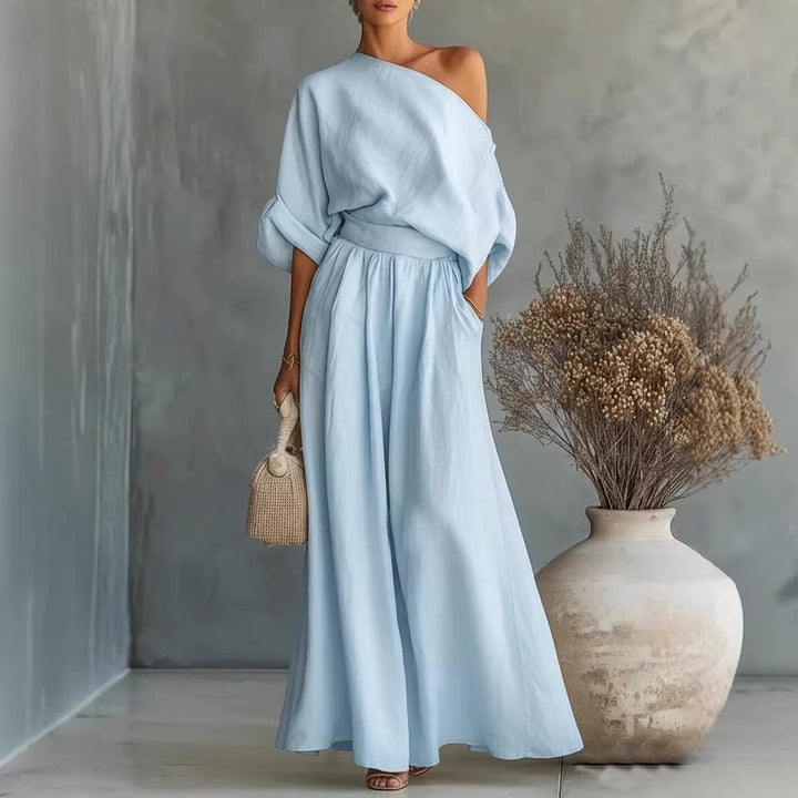Stylish women's one-shoulder maxi dress, a flowing design for chic parties & evening wear.