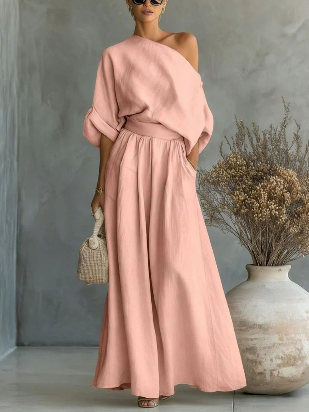 Flowing one-shoulder maxi dress for women, sophisticated and comfortable resort wear.