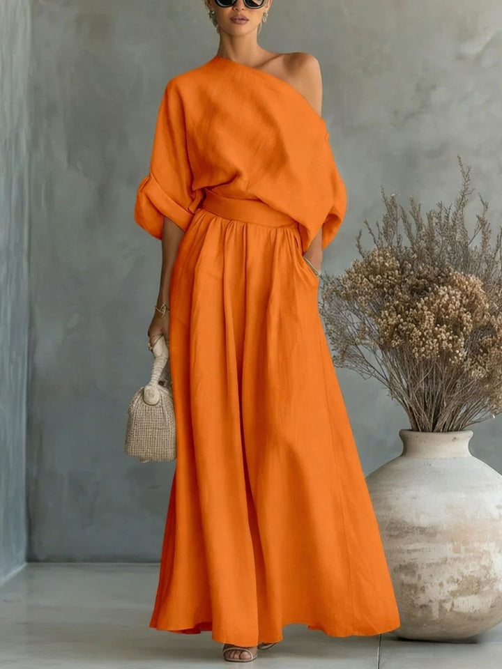 Elegant A-line women's maxi dress, one-shoulder design ideal for chic summer parties.