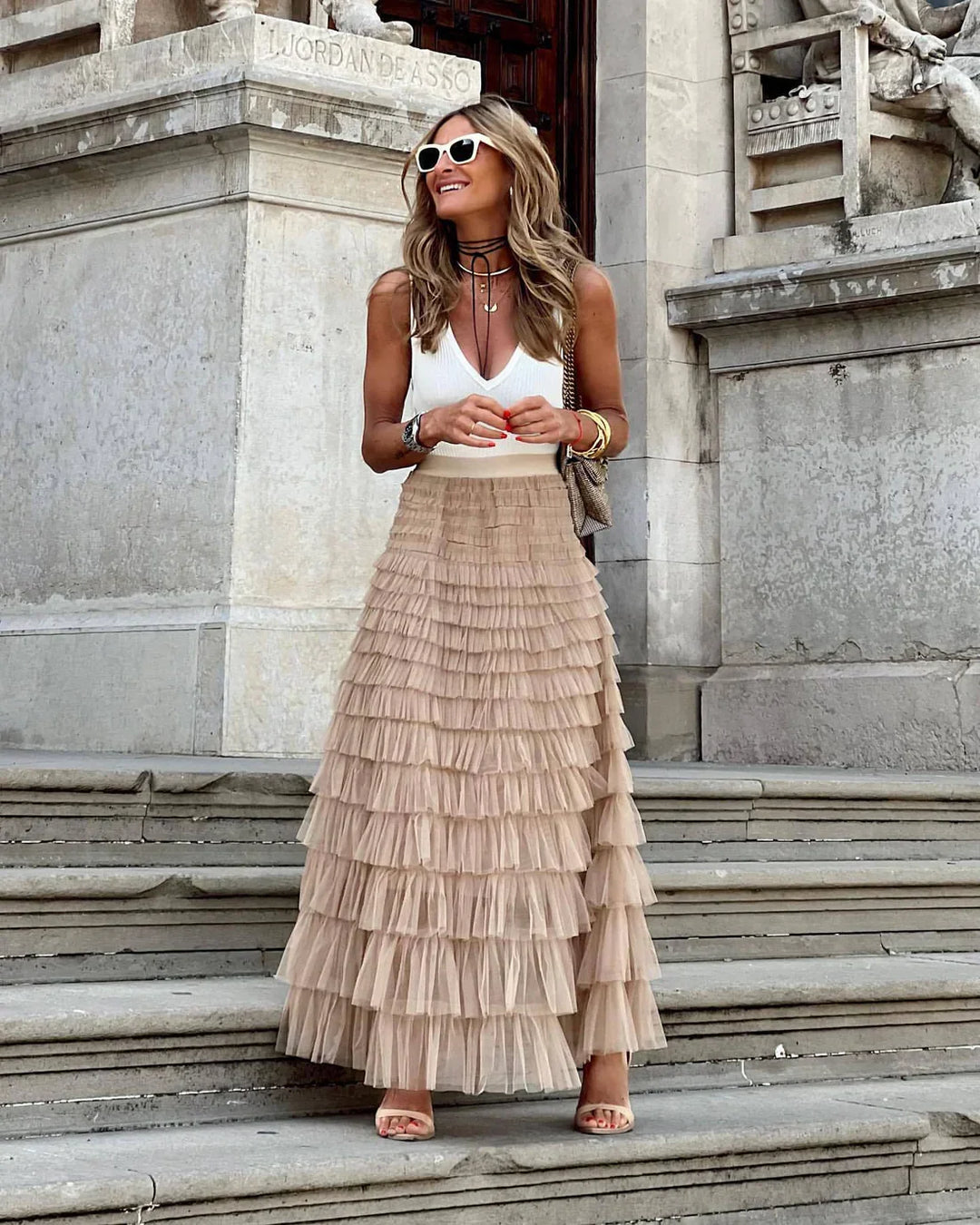 Women's flowy tiered ruffle midi skirt, perfect for elegant casual or party wear. Graceful summer fashion.