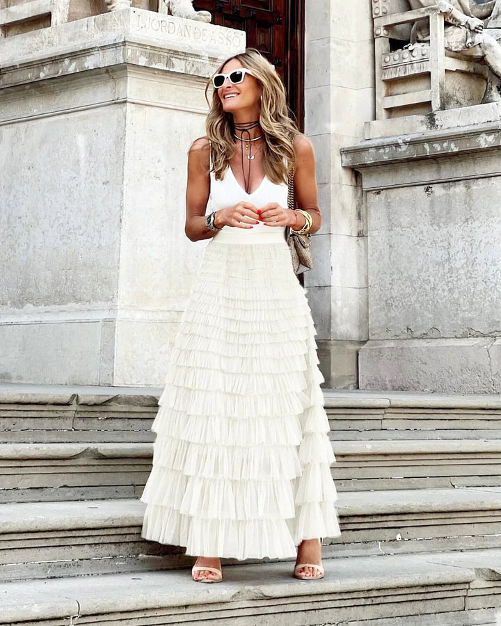 Graceful women's tiered ruffle midi skirt with a flowy silhouette. Versatile for spring, summer, party, casual.