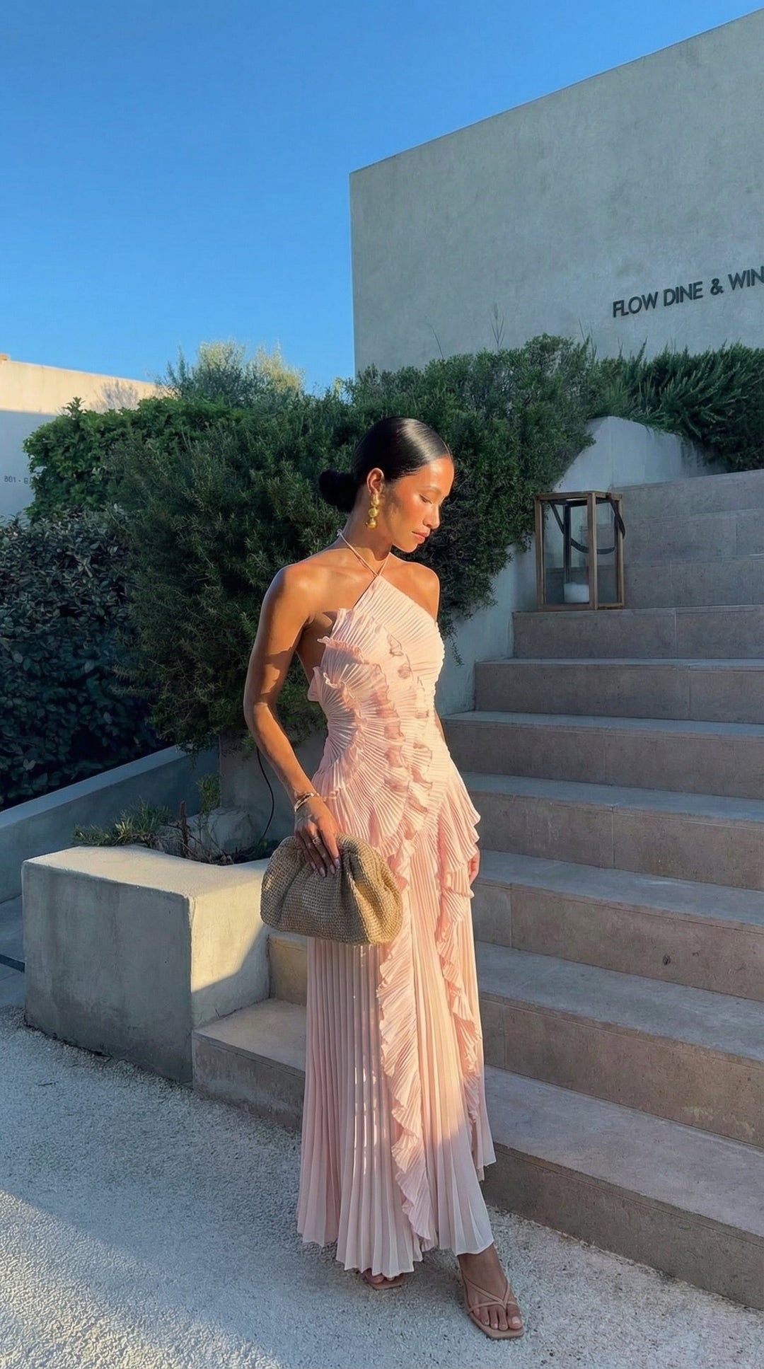 Formal women's cocktail dress, flowy ruffle maxi with a chic halter neck.