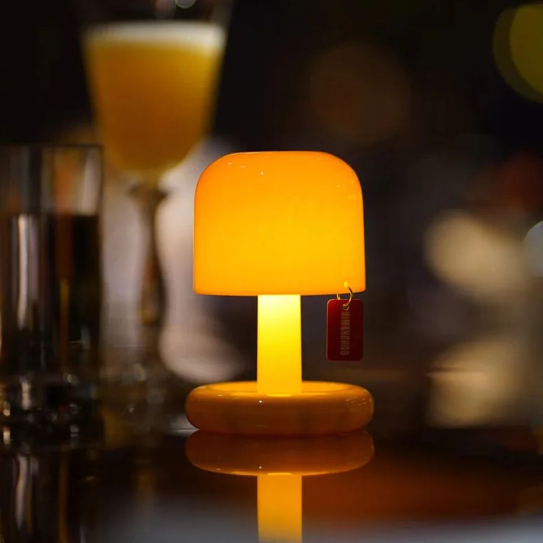 Mini LED sunset lamp casting warm, ambient light, perfect for home decor & mood lighting.