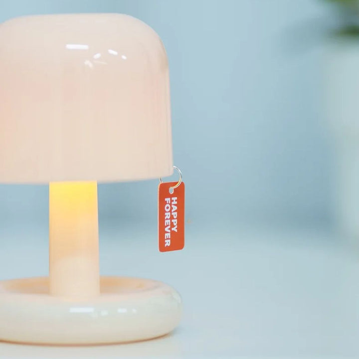 Elegant mini sunset lamp enhancing living room decor with warm, creative LED ambient light.