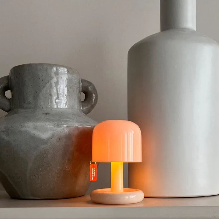 Versatile mini LED sunset lamp for desktops or shelves, delivering atmospheric ambient and mood lighting.