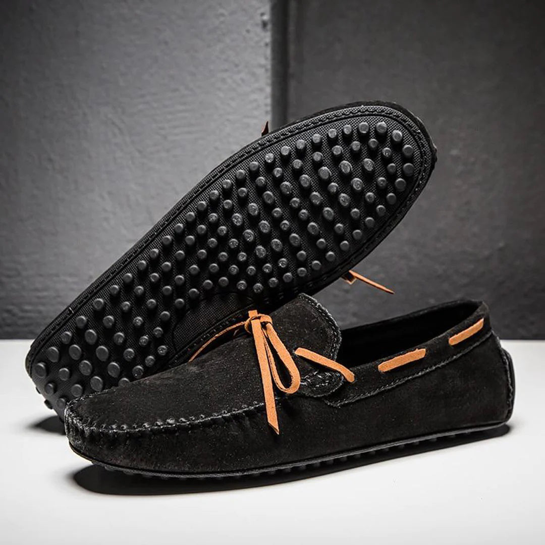 Men's slip-on boat shoes with a comfortable, flexible sole, perfect for driving and casual wear.