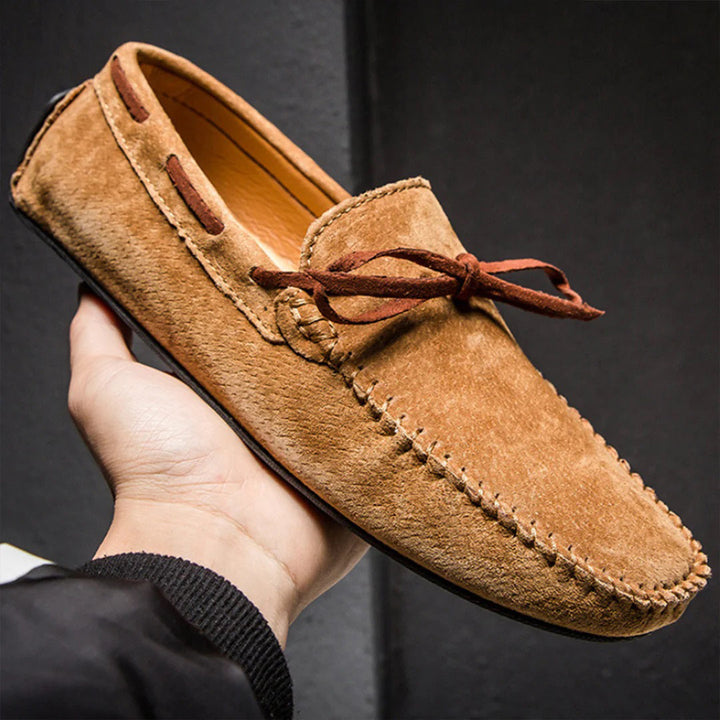 Cozy men's slip-on boat shoes for easy wear, featuring a comfortable design and grip sole.