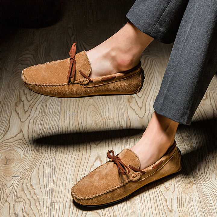 Stylish men's boat shoes, designed as comfortable slip-on driving loafers for everyday wear.