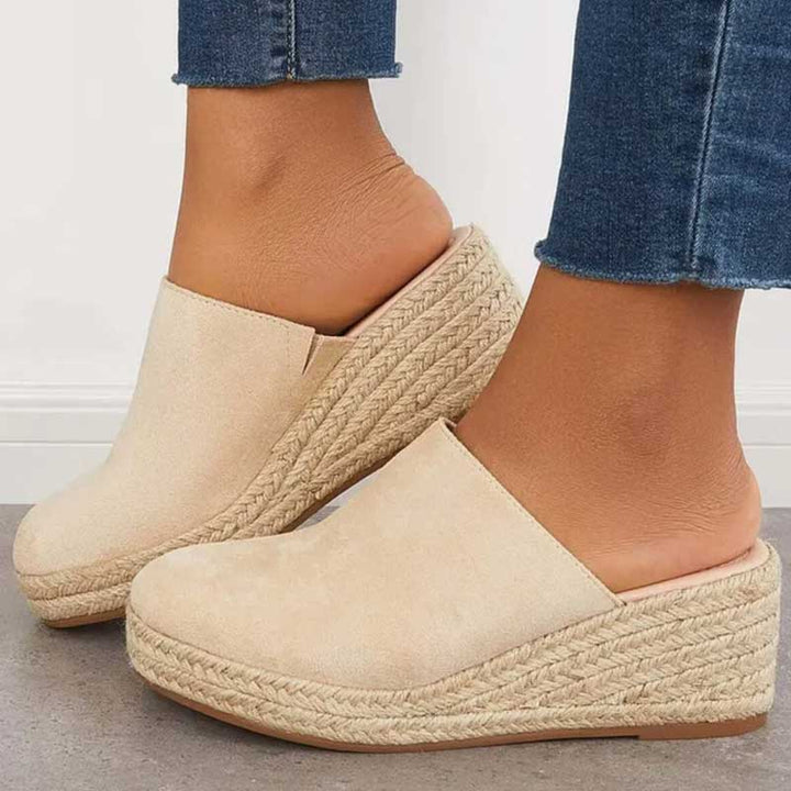 Stylish women's slip-on sandals, open-toe design, offering superior arch support & comfort for all-day wear.