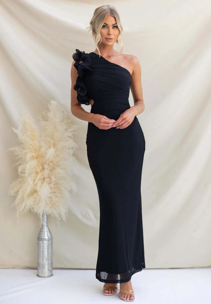 Sophisticated women's maxi dress with a dramatic one-shoulder ruffle, ideal for elegant events.