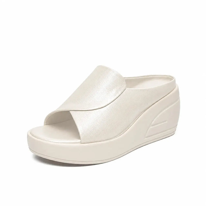 Stylish women's wedge sandals with orthopedic arch support; comfortable slip-ons offering foot pain relief.
