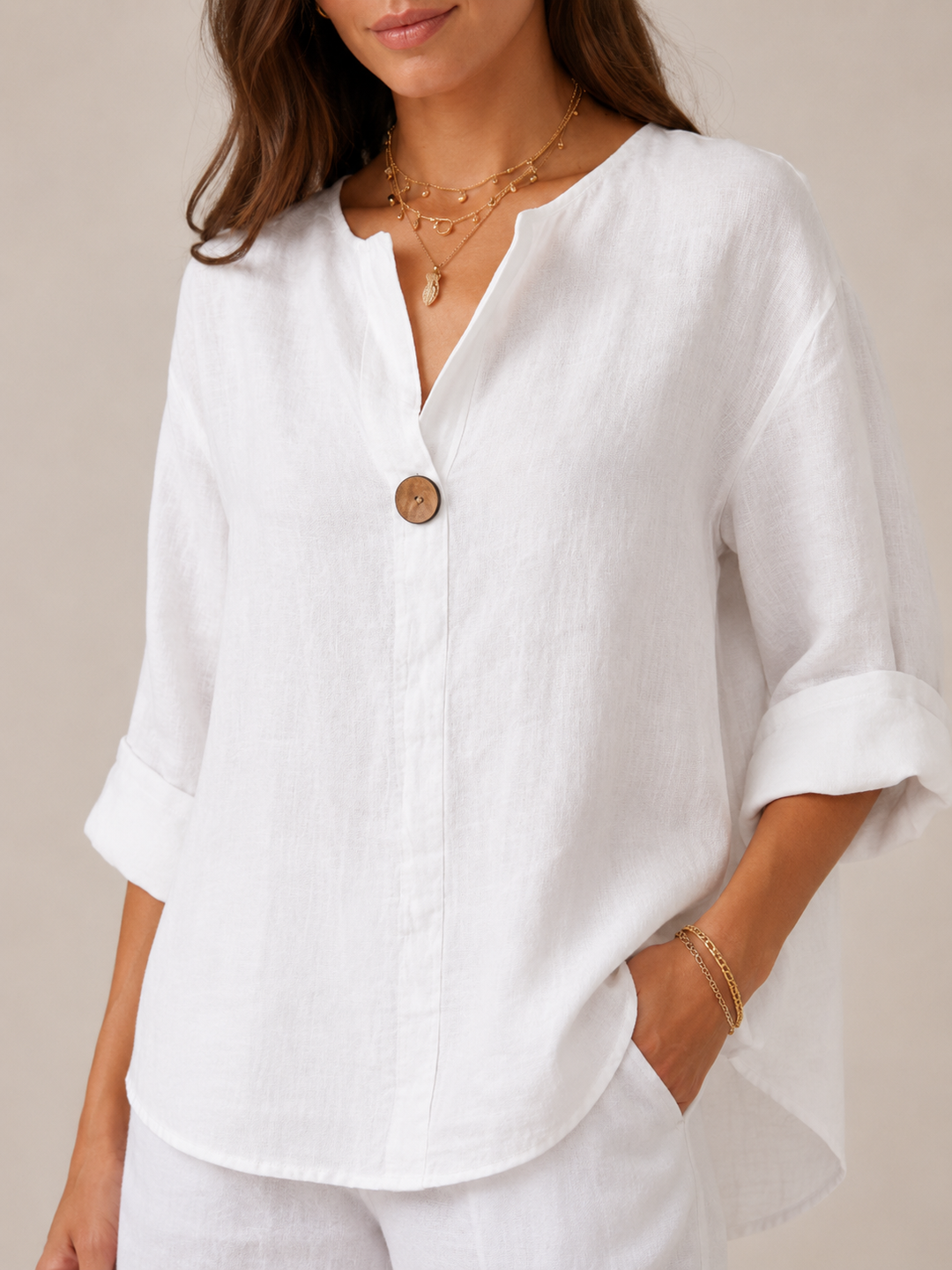 Womens top: elegant open collar, 3/4 sleeve, button front blouse for a sophisticated and relaxed fit.