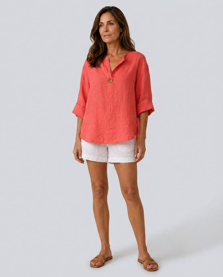 Button-front women's blouse, 3/4 sleeve, elegant open collar design for versatile and chic everyday style.