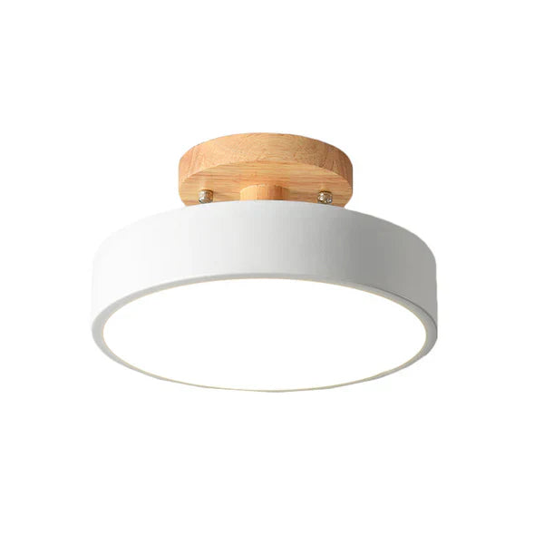 Minimalist wood accent LED ceiling light, perfect for hallways.