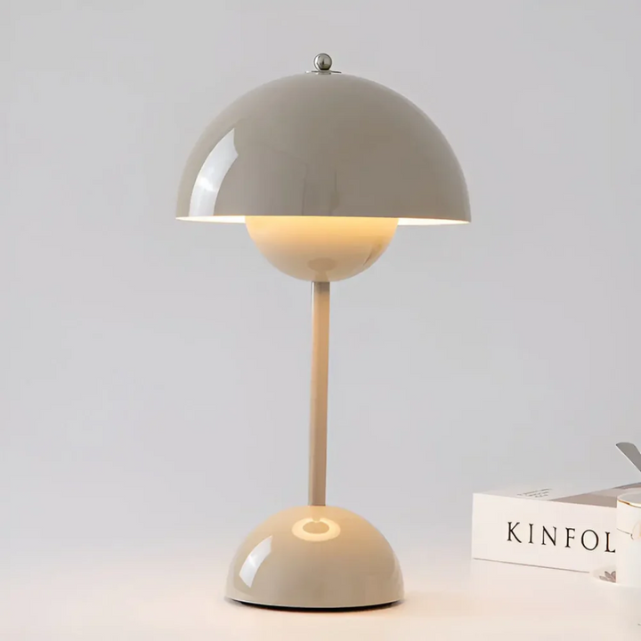 Stainless steel cordless LED lamp. Scandinavian desk or mood lighting. Modern, portable, & rechargeable.