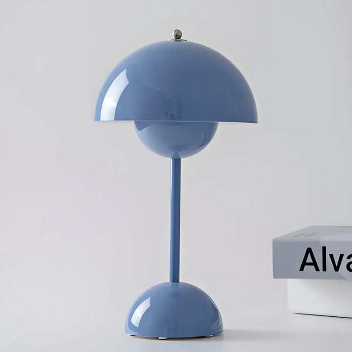 Scandinavian cordless LED lamp. Elegant table lamp for desk, accent, or mood lighting, indoor/outdoor home decor.