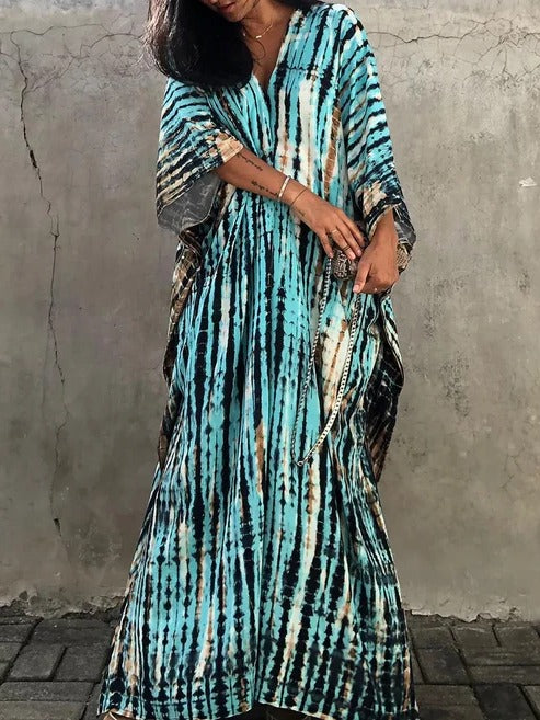 Elegant tie-dye kaftan maxi dress. Women's flowing V-neck beach dress, ideal for summer resort.