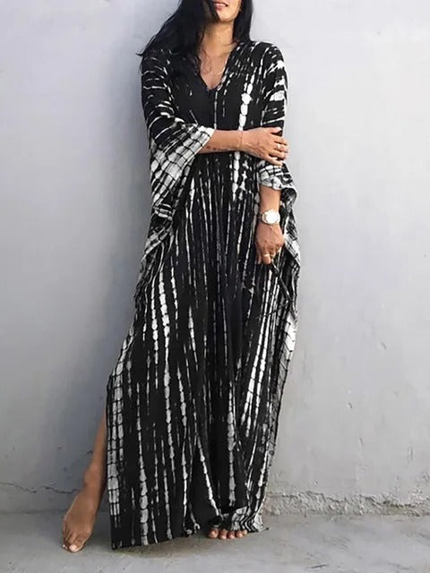 Casual tie-dye kaftan maxi dress for women. Flowing beach dress, perfect for summer resort wear.