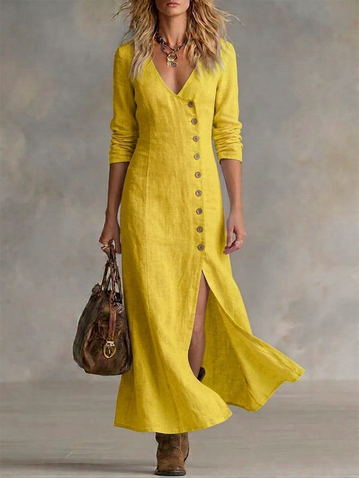Versatile women's long sundress with V-neck, button detail & split hem for casual or elegant looks.