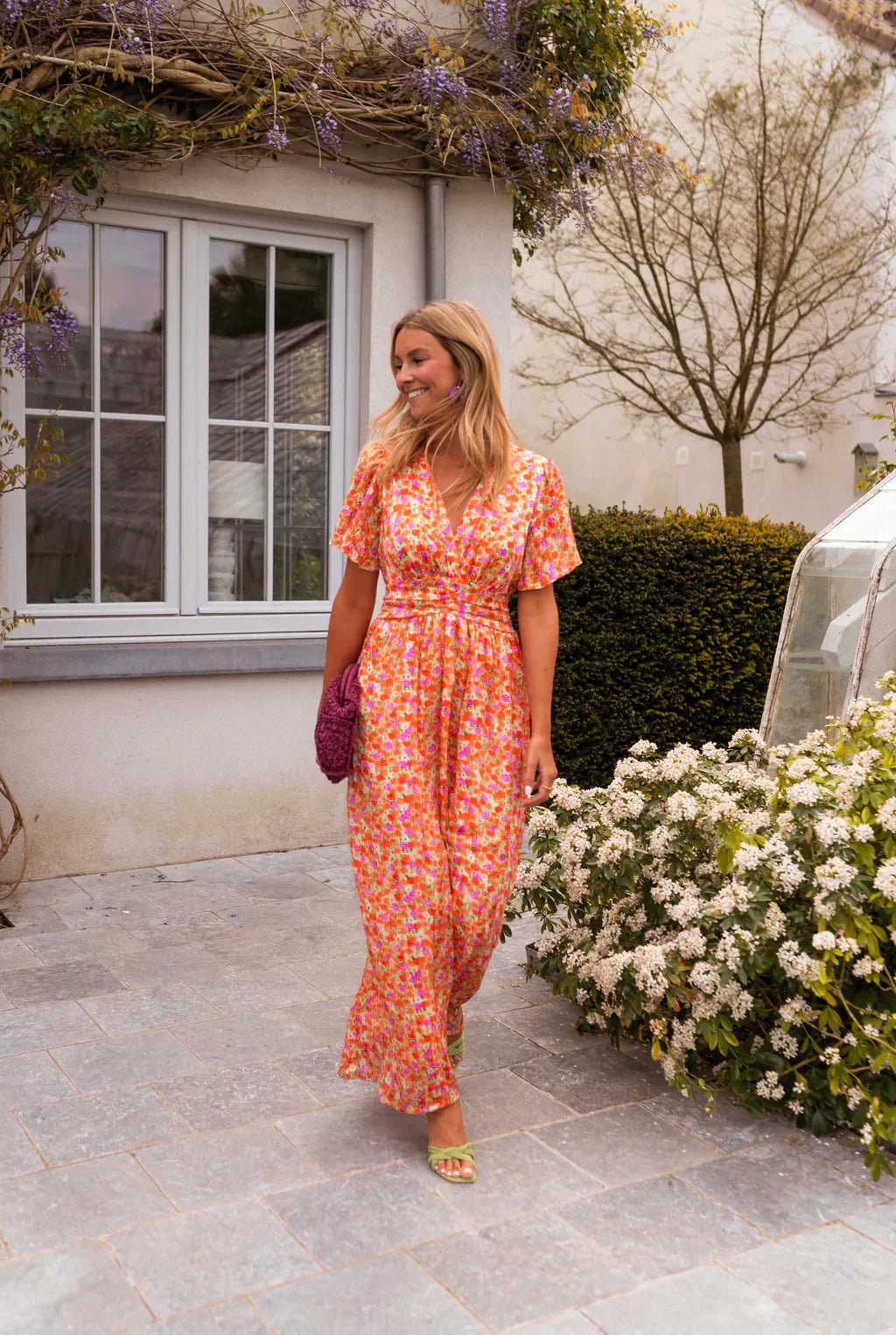 Women's elegant floral pleated V-neck cocktail maxi dress, a chic long summer party dress.