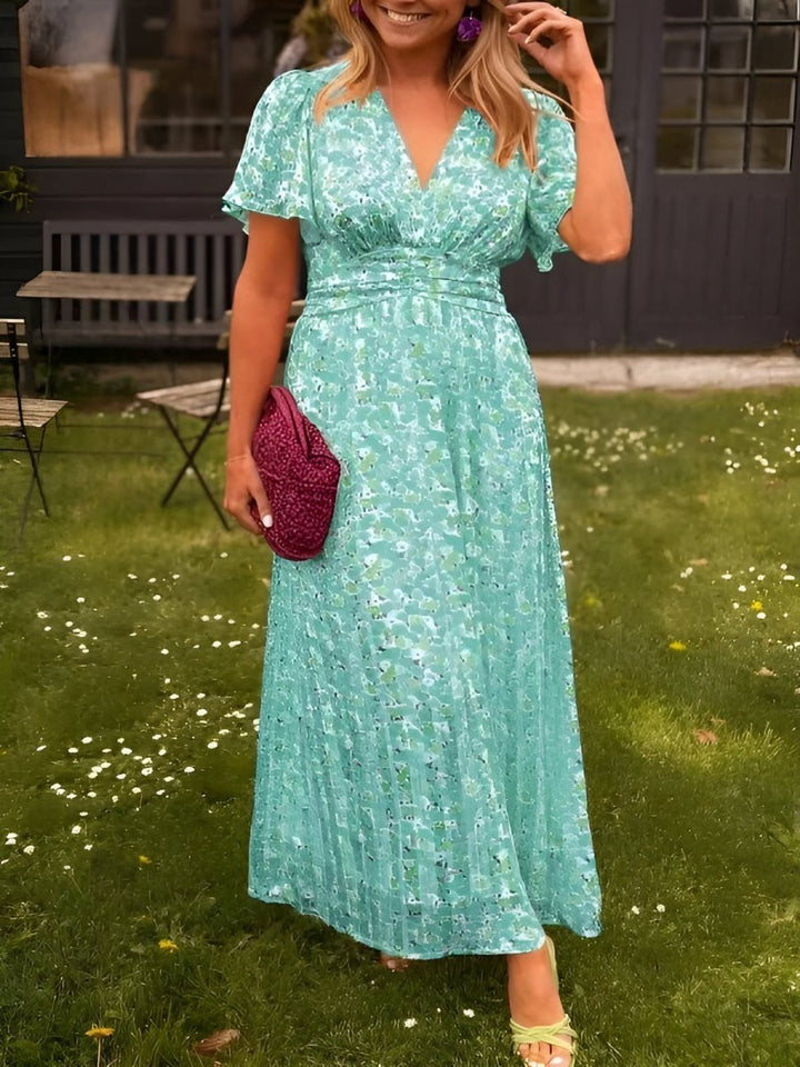 Gorgeous floral pleated V-neck maxi dress, a comfortable & elegant women's cocktail party gown.