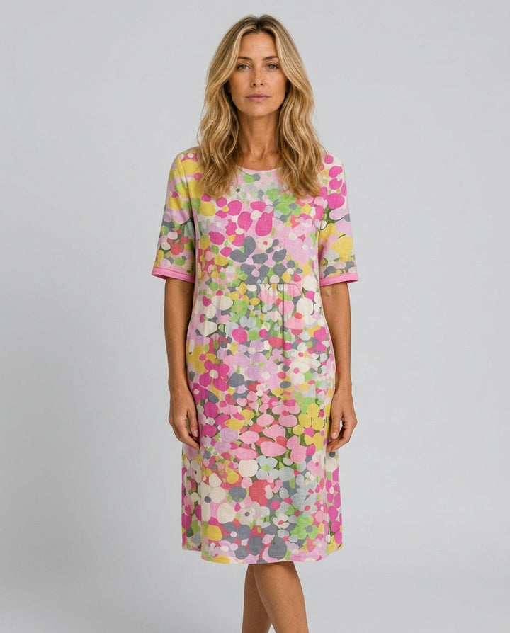 Casual women's midi dress with an abstract floral print, perfect for comfortable summer days.