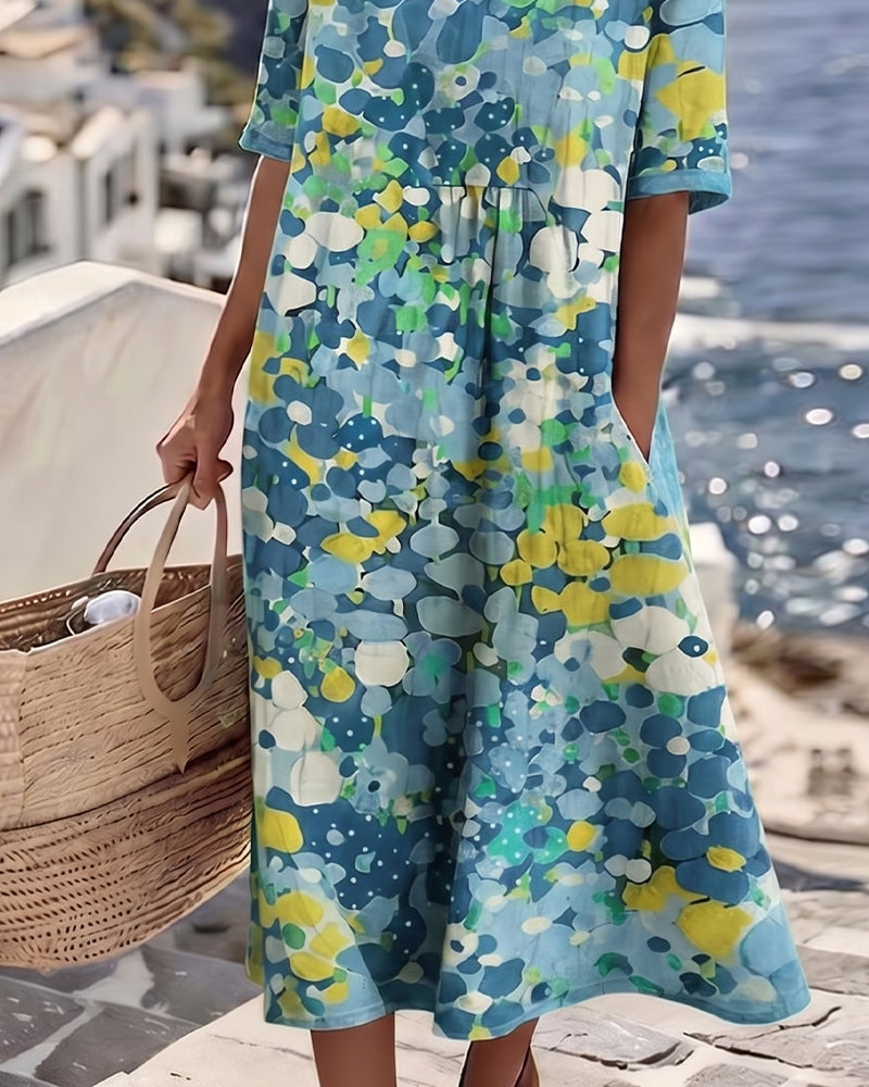 Versatile floral short-sleeve midi dress for women, ideal for casual warm-weather outings.
