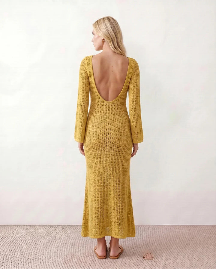 Chic women's plunge neck crochet maxi dress. Flowy long sleeves. Great for vacation & events.