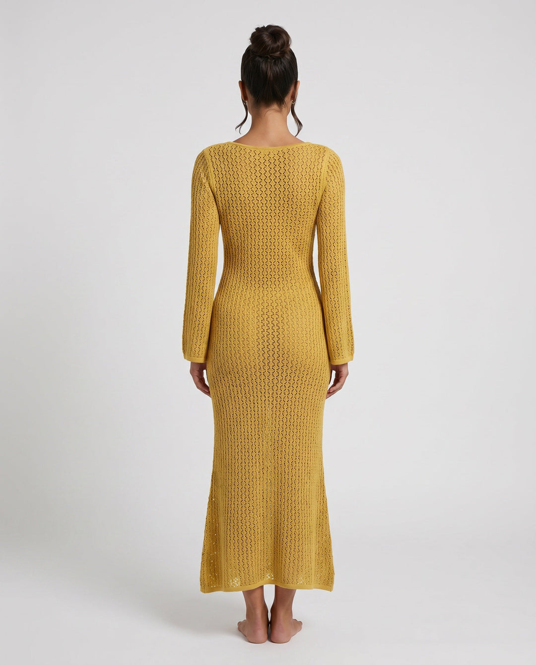 Elegant women's crochet maxi dress. Plunge V-neck, long sleeves. Perfect for beach vacation.