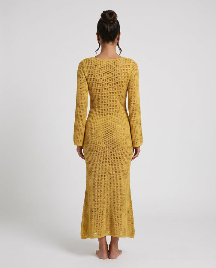 Elegant women's crochet maxi dress. Plunge V-neck, long sleeves. Perfect for beach vacation.