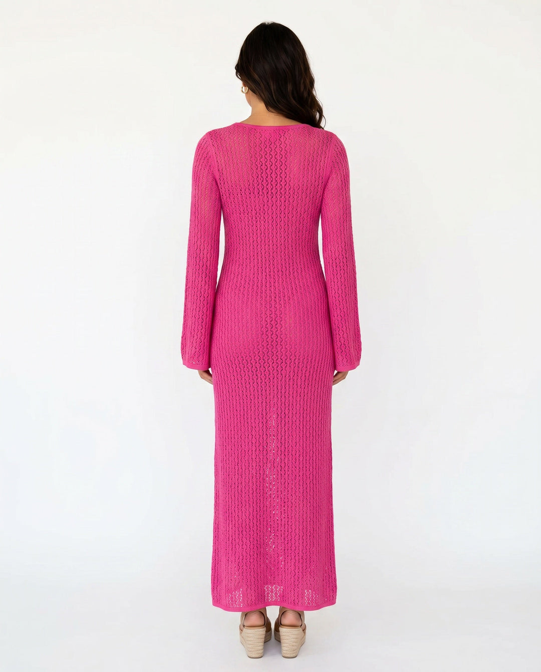 Women's fashionable plunge neck crochet maxi dress. Long sleeve design for summer events.