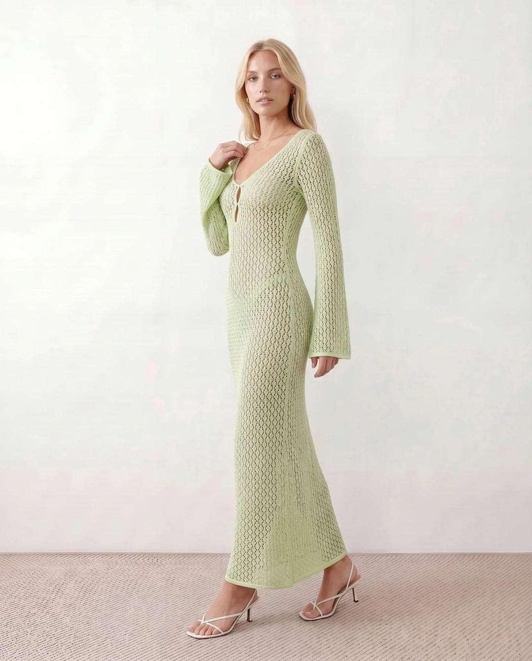 Stylish women's long sleeve crochet maxi dress, deep V-neck. Elegant for summer evenings.