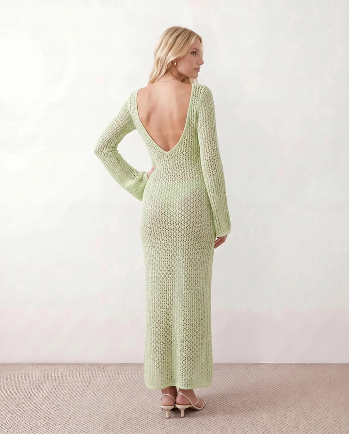 Elegant women's plunge neck long sleeve crochet maxi dress. Perfect for a summer getaway.