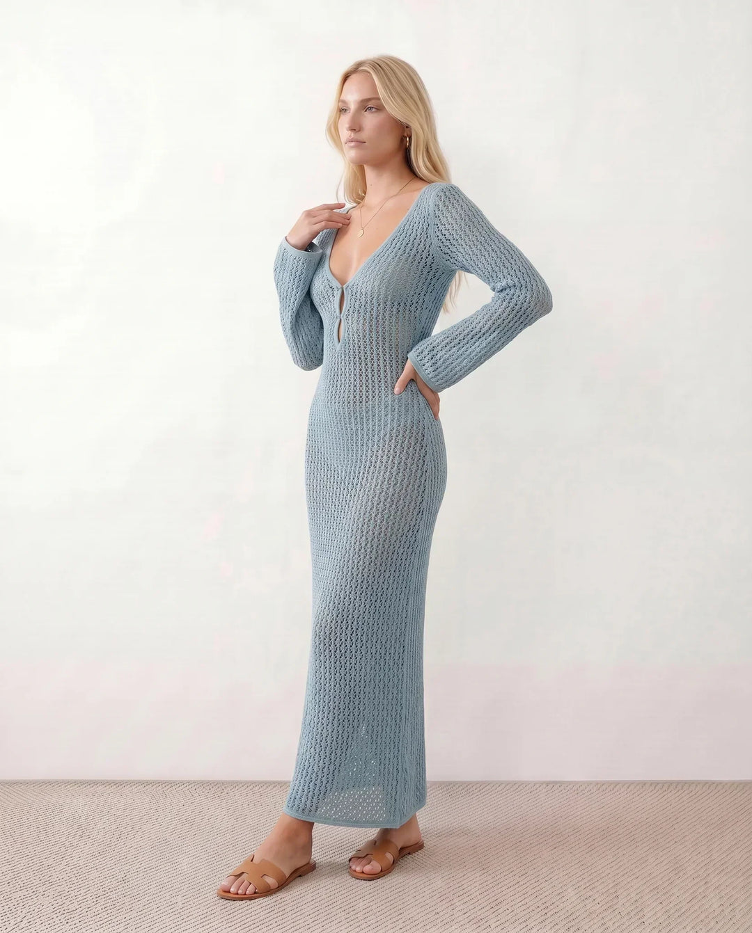 Elegant women's long sleeve crochet maxi dress with a flattering plunge neck. Beach ready.