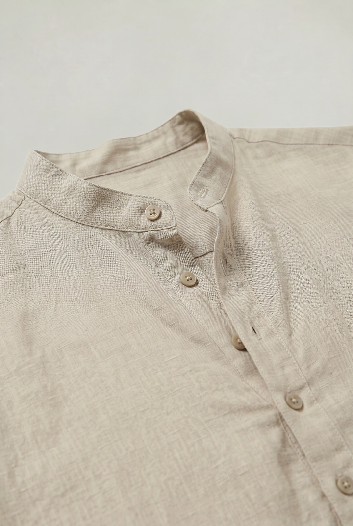 Lightweight and breathable men's summer shirt with a chic grandad collar and adaptable roll-up sleeves.