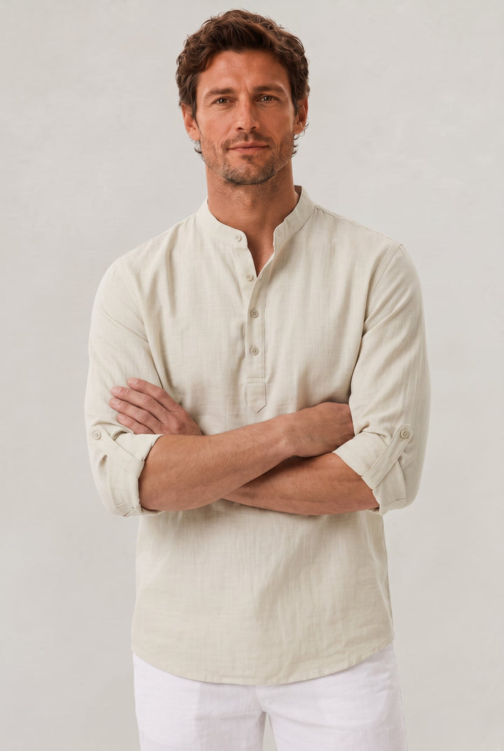 Modern men's fashion shirt: grandad collar, roll-up sleeves, relaxed fit. Perfect for warm weather comfort & style.