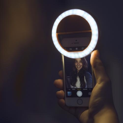 Illuminate your selfies & videos with this portable clip-on LED ring light for phones.