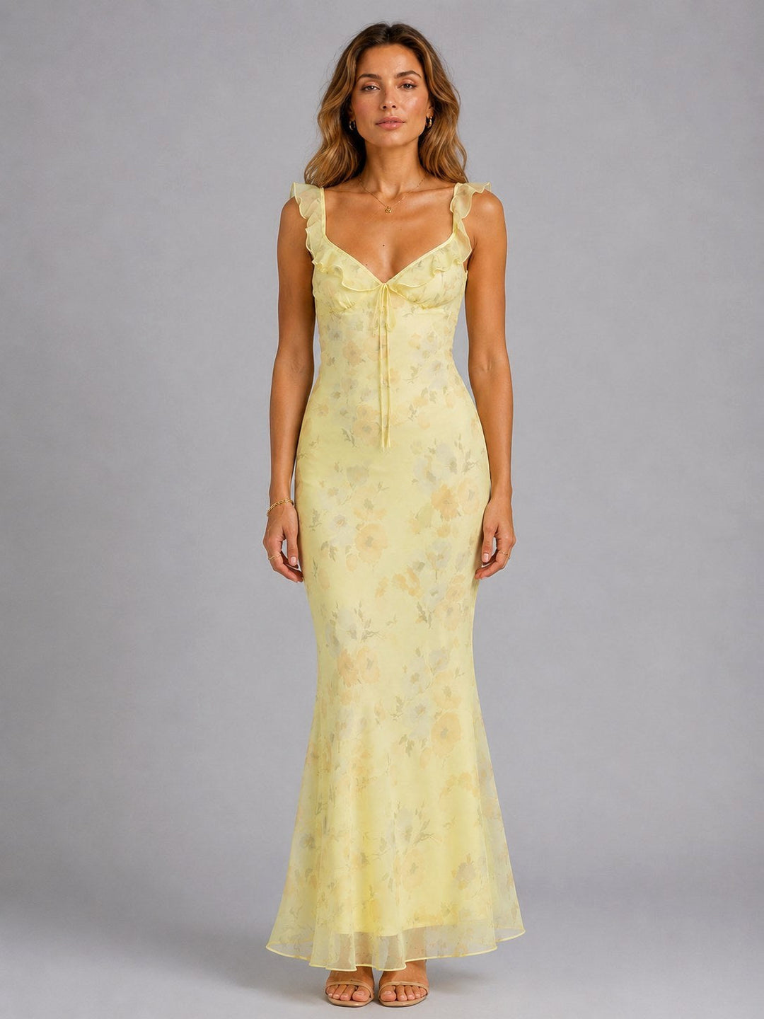 Women's elegant floral maxi dress with delicate ruffle straps, perfect for summer weddings or party occasions.