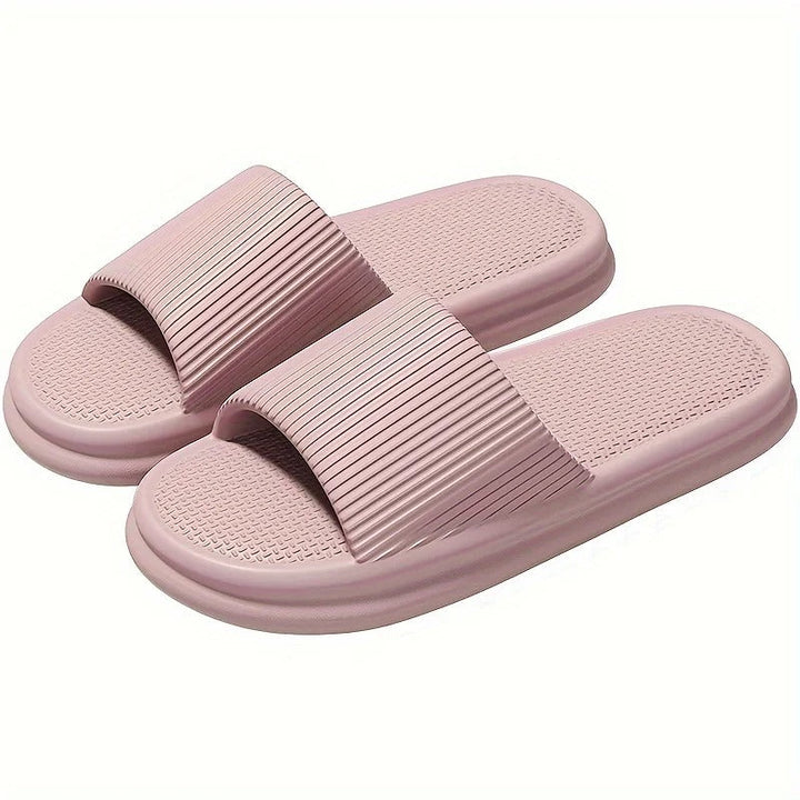 Easy-clean, cushioned, shock-absorbing unisex slippers for ultimate foot comfort & home wear. Soft, anti-slip casual design.