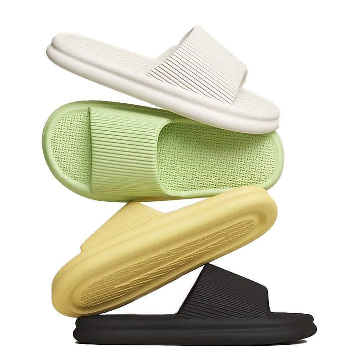 Cloud-soft, shock-absorbing unisex slippers. Cushioned, lightweight, anti-slip for ultimate foot relief & home comfort.