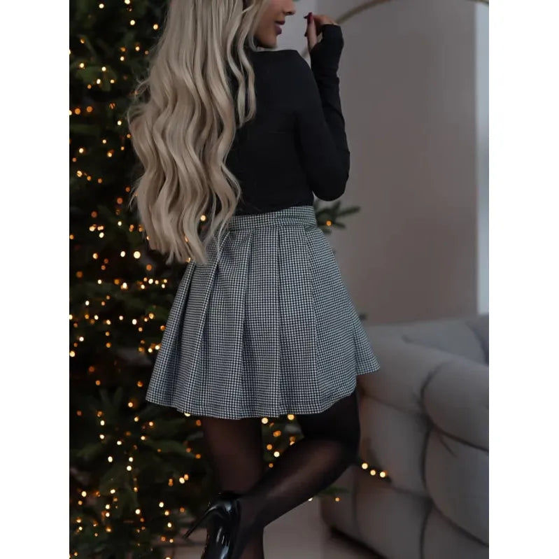 Women's Romy mini skirt. Plaid checked pattern, versatile above-knee length for chic, casual fashion.