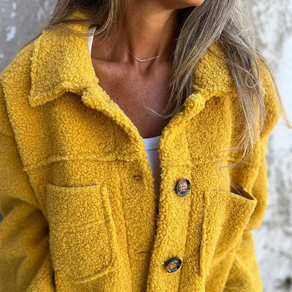 Stylish women's teddy short jacket, warm and cozy with a chic lapel collar. Perfect for autumn fashion.