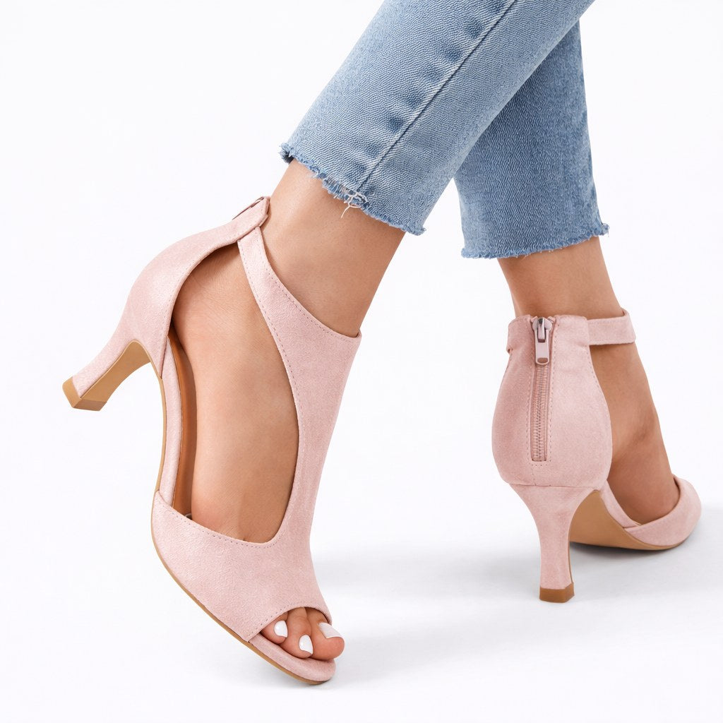 Elegant women's cushioned heeled sandals, showcasing stylish cut-out side straps & comfortable design for chic fashion.